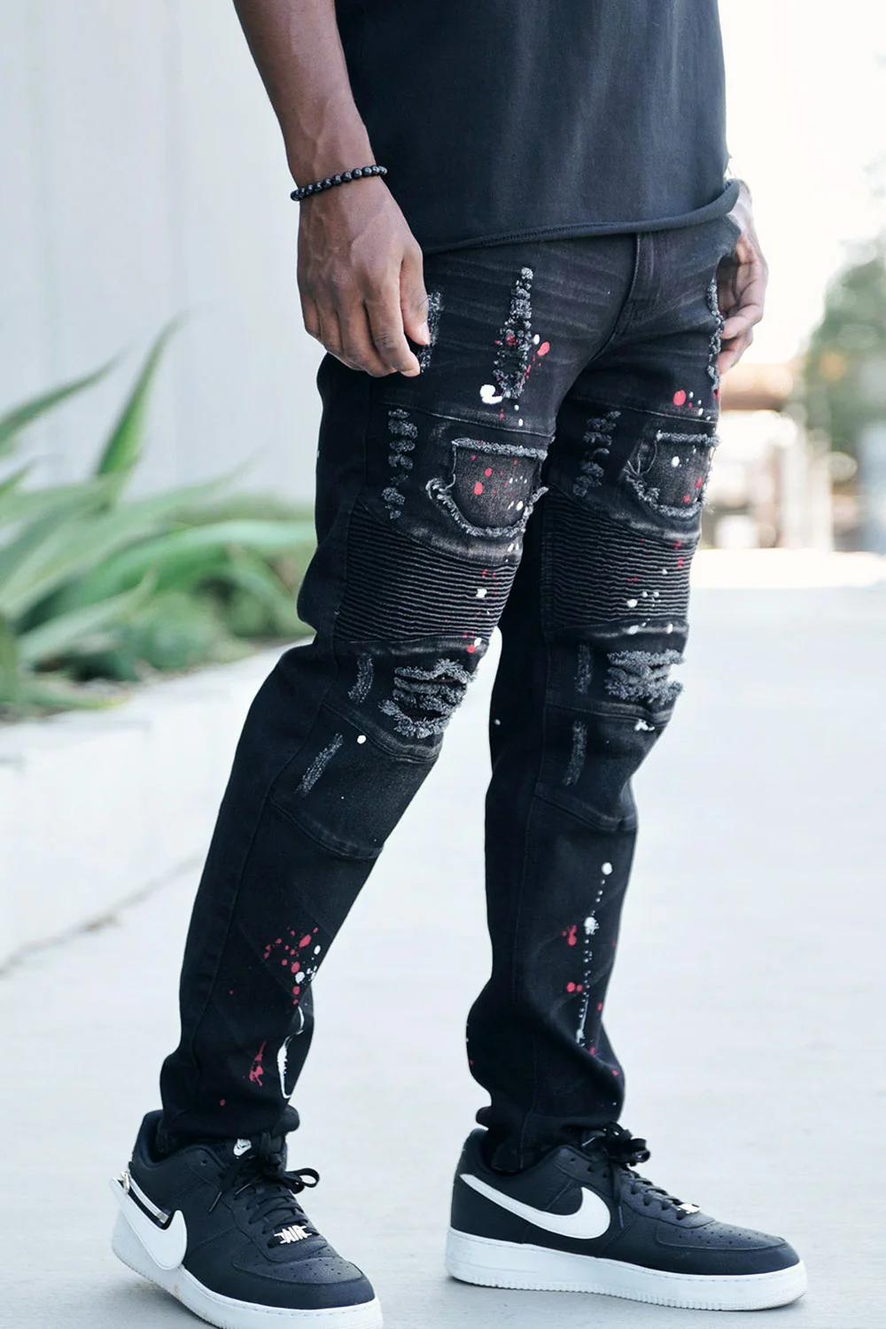 Stacked Paint Splatter Biker Jeans - Image 6